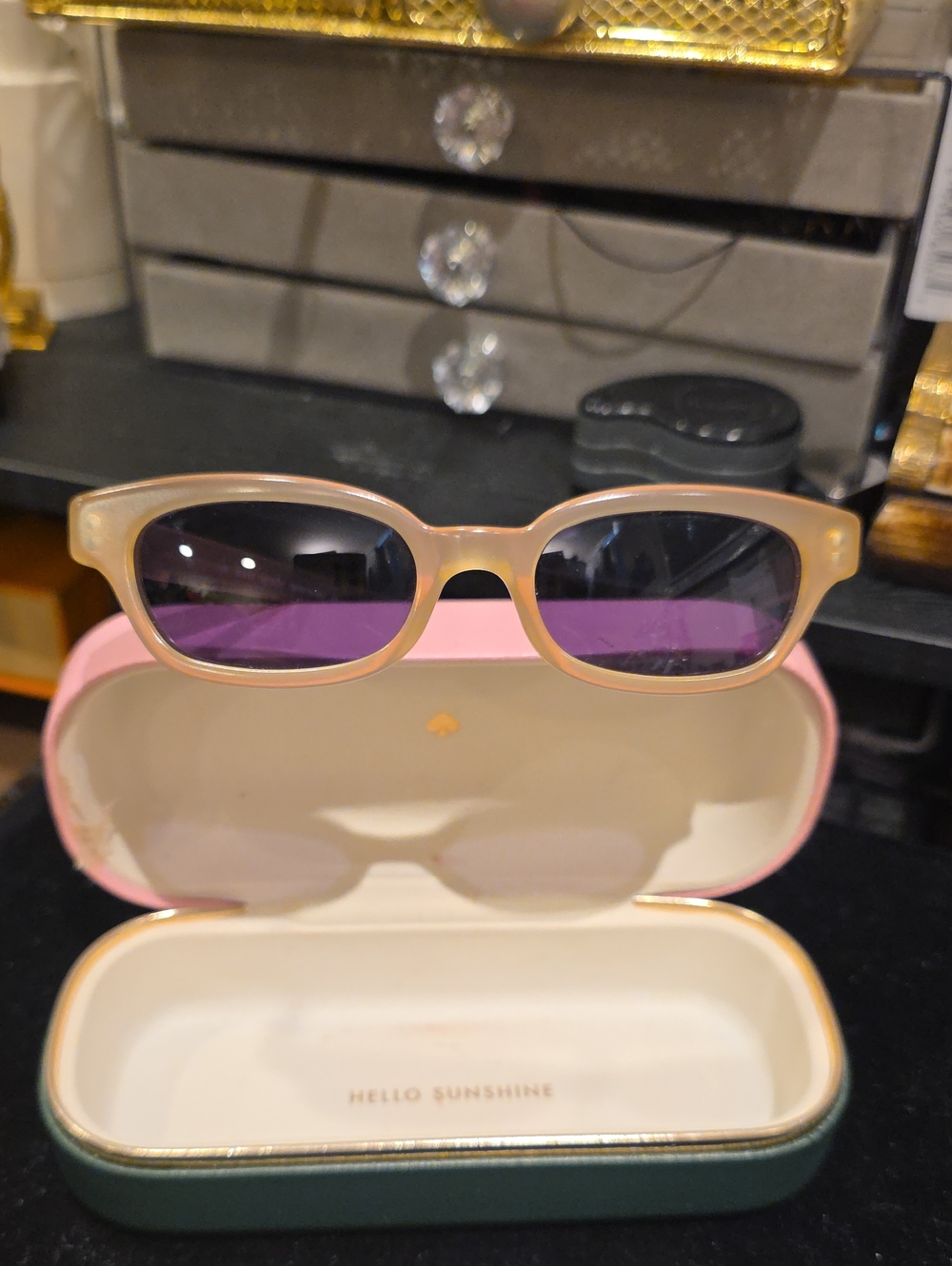 kate spade translucent beige frame sunglasses with purple lenses